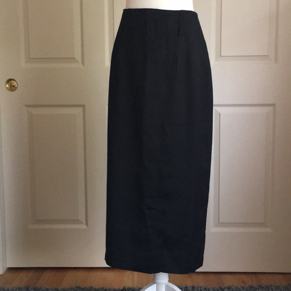 Black pencil skirt, faux wrap style. Fully lined.